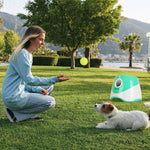 Happy Labrador retriever using ThePawtale automatic fetch machine in the backyard.